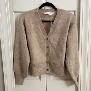 Puff sleeve button down cropped sweater.